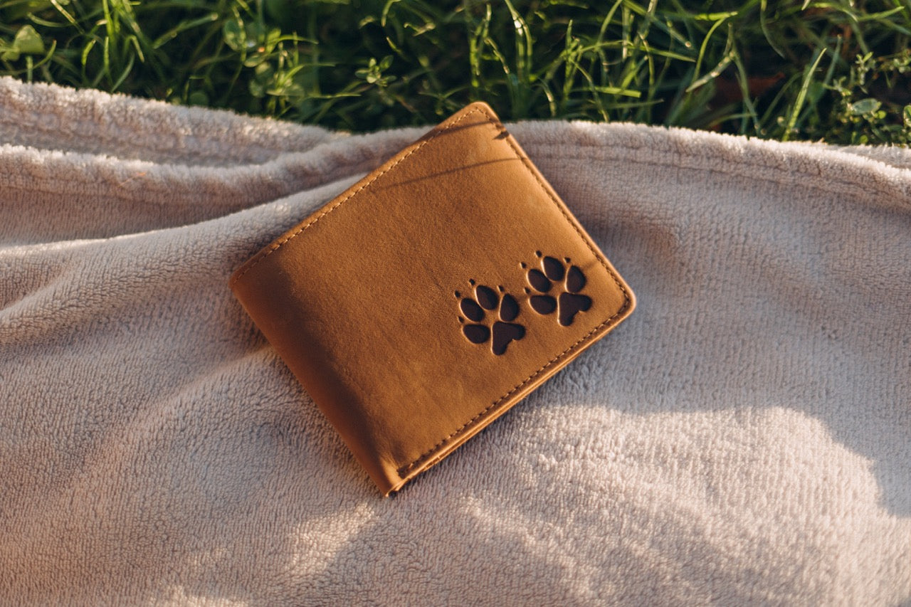 Portemonnaie Jäger mit Hundepfoten